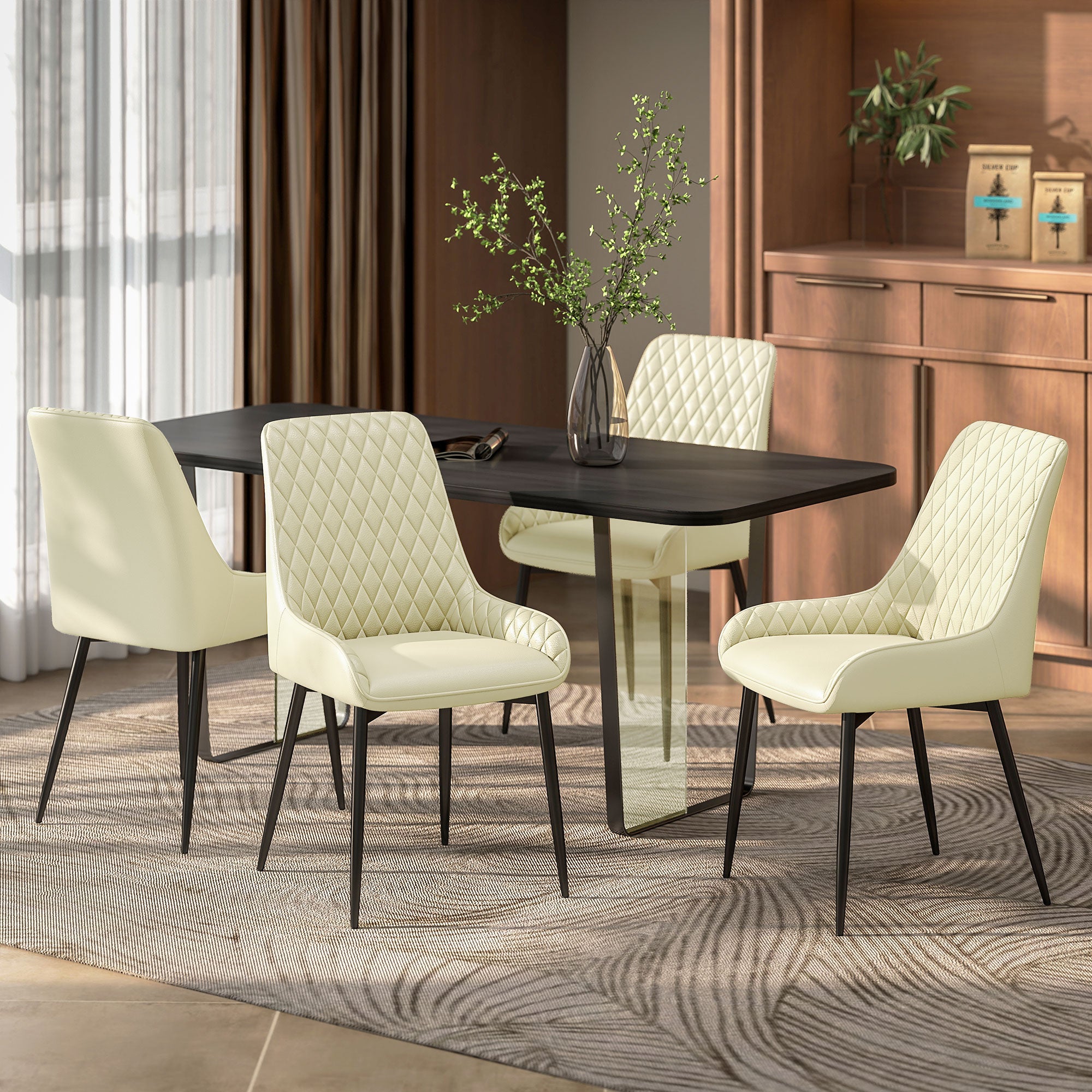 Set of 4 upholstered kitchen chairs, cream color.