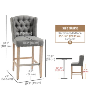 Set of 2 upholstered bar stools with studded back and footrest, gray