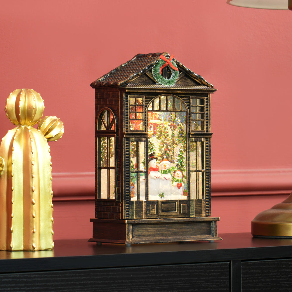 Boule à neige musicale en forme de lanterne avec lumières