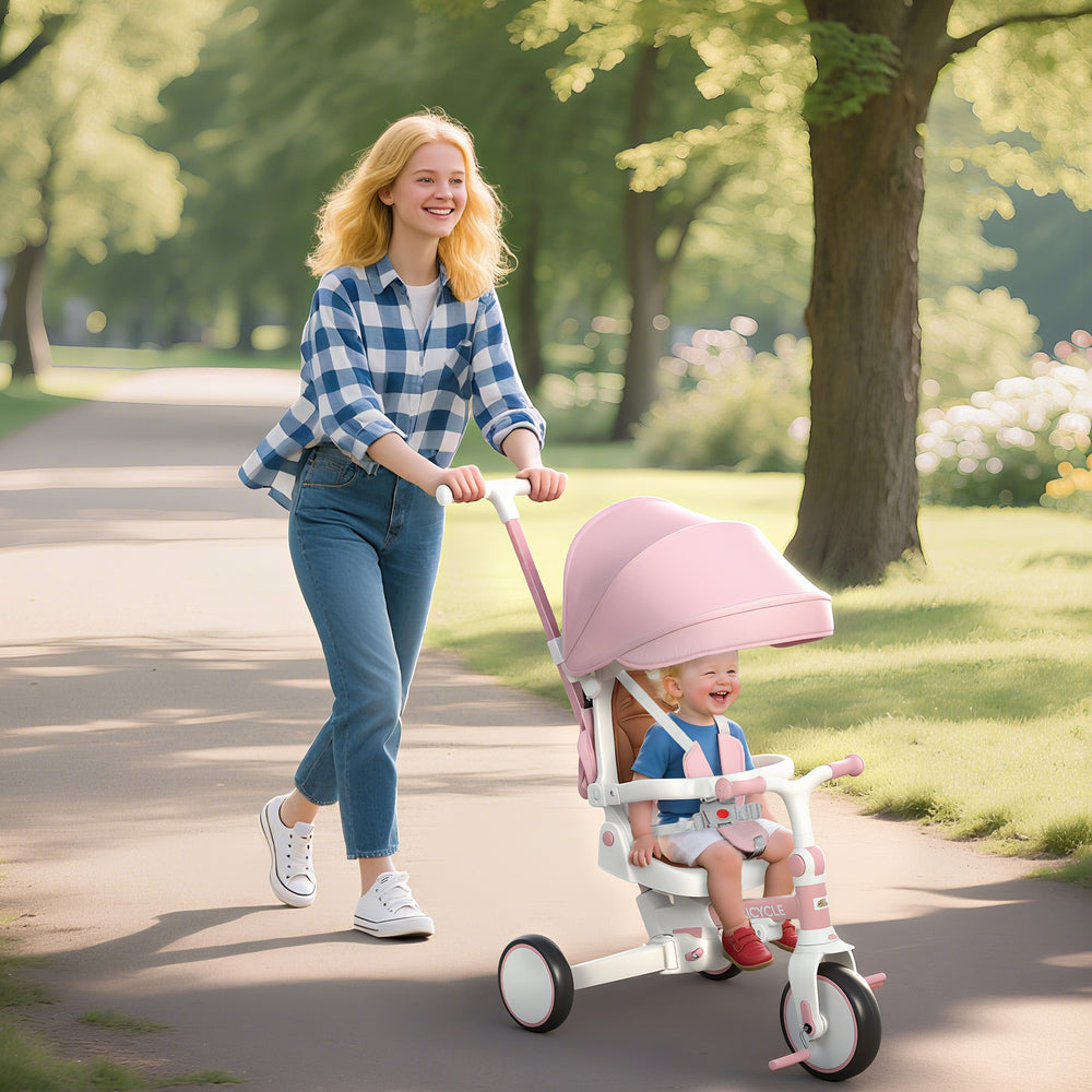 Tricycle 7 en 1 avec harnais de sécurité, poignée parentale réglable et amovible, rose