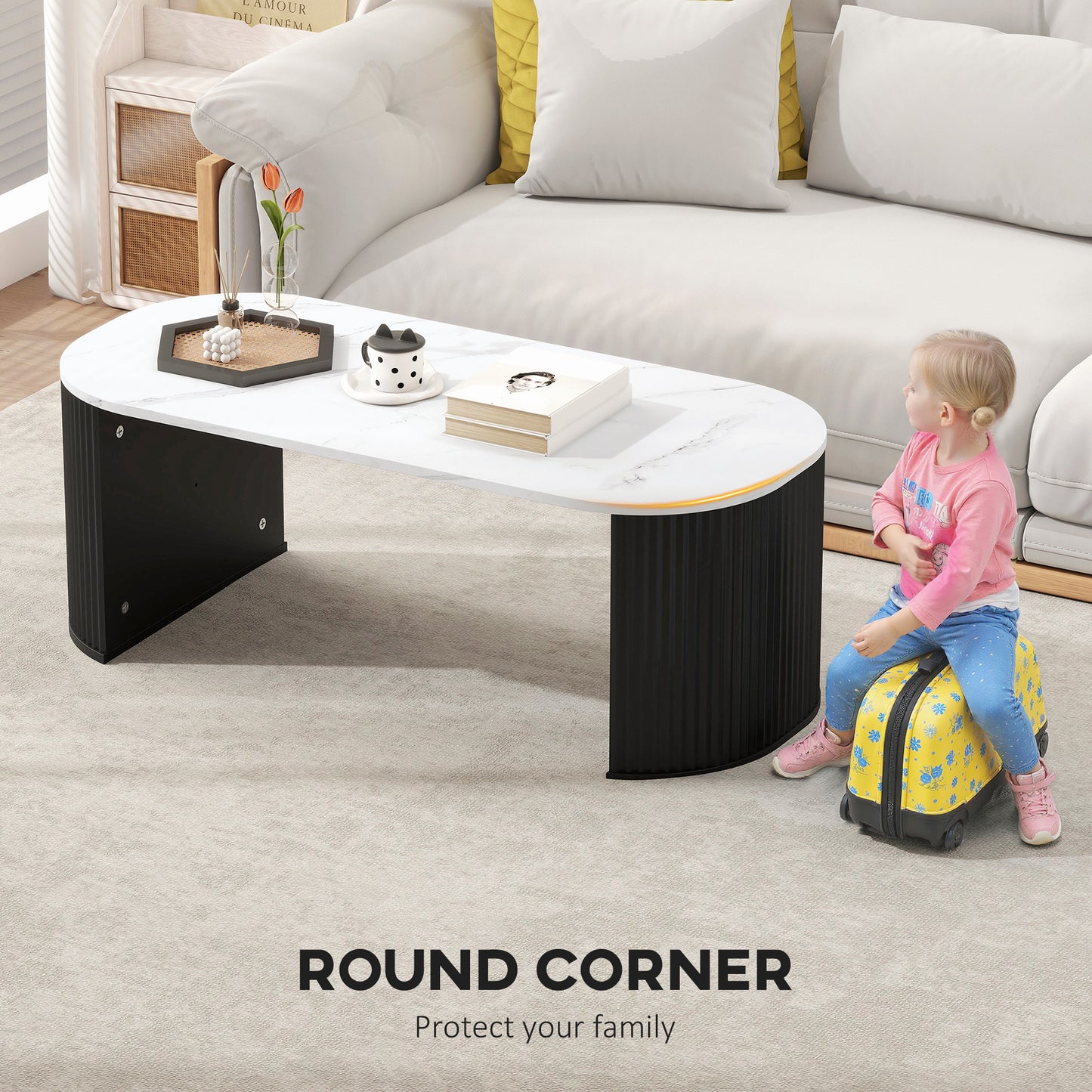 Table de salon moderne effet marbre avec coins arrondis et pieds épais, noire