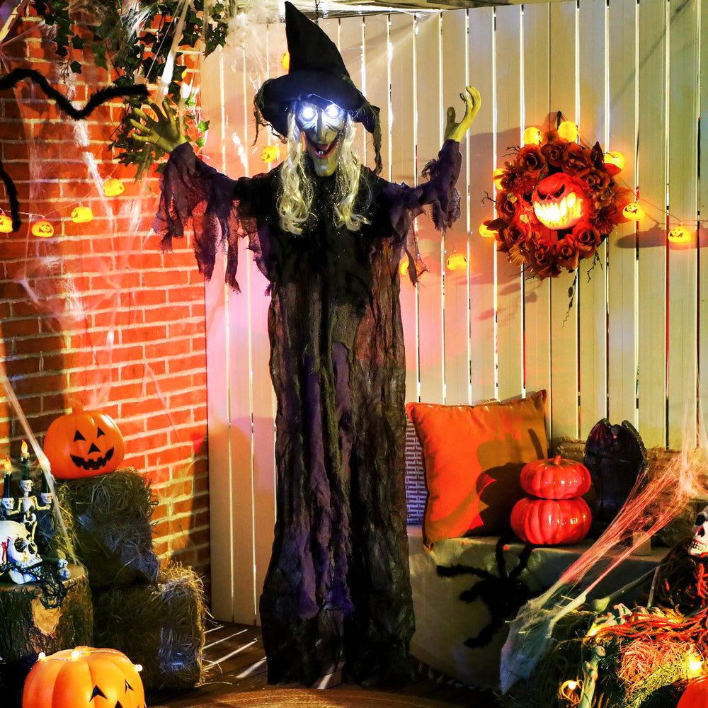 Life-size animated hanging witch for Halloween with light-up LED eyes,
