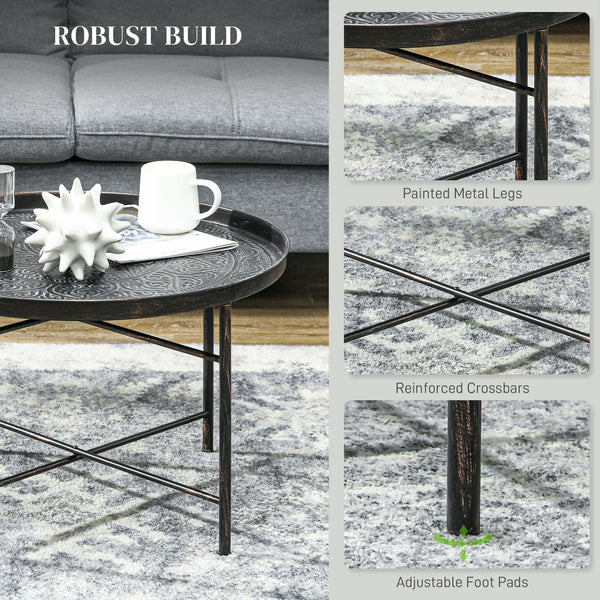 Table basse vintage ronde avec plateau martelé et structure en métal, couleur étain