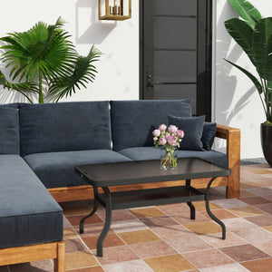 Table basse d'extérieur noire avec plateau en verre trempé et structure en métal, parfaite pour un patio ou une terrasse moderne