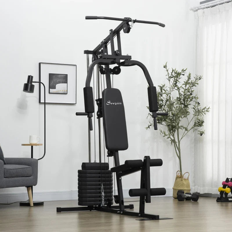 Équipement de musculation complet incluant banc, station multifonction, haltères et accessoires, idéal pour entraînement à domicile ou en salle