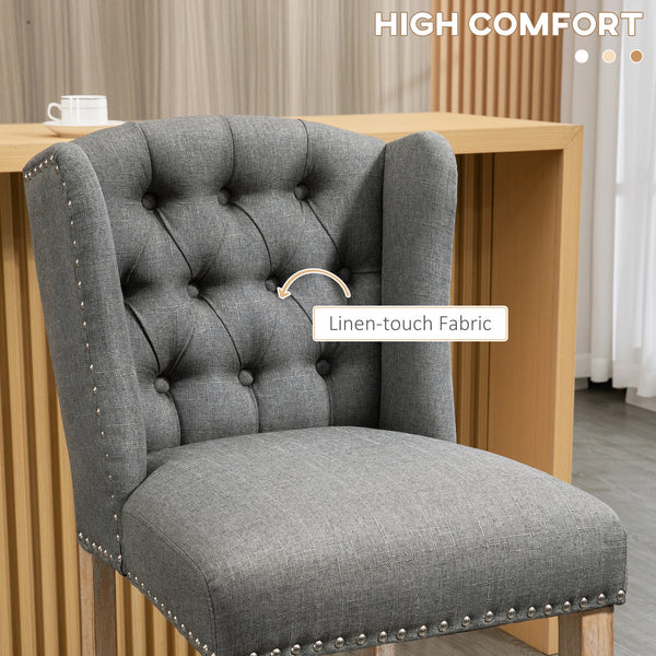 Set of 2 upholstered bar stools with studded back and footrest, gray