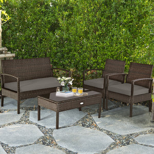 Set of 4 upholstered rattan patio furniture pieces - brown