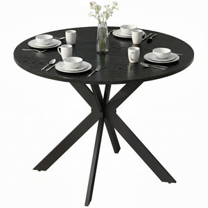 Table de salle à manger ronde contemporaine avec pieds en acier, aspect bois noir