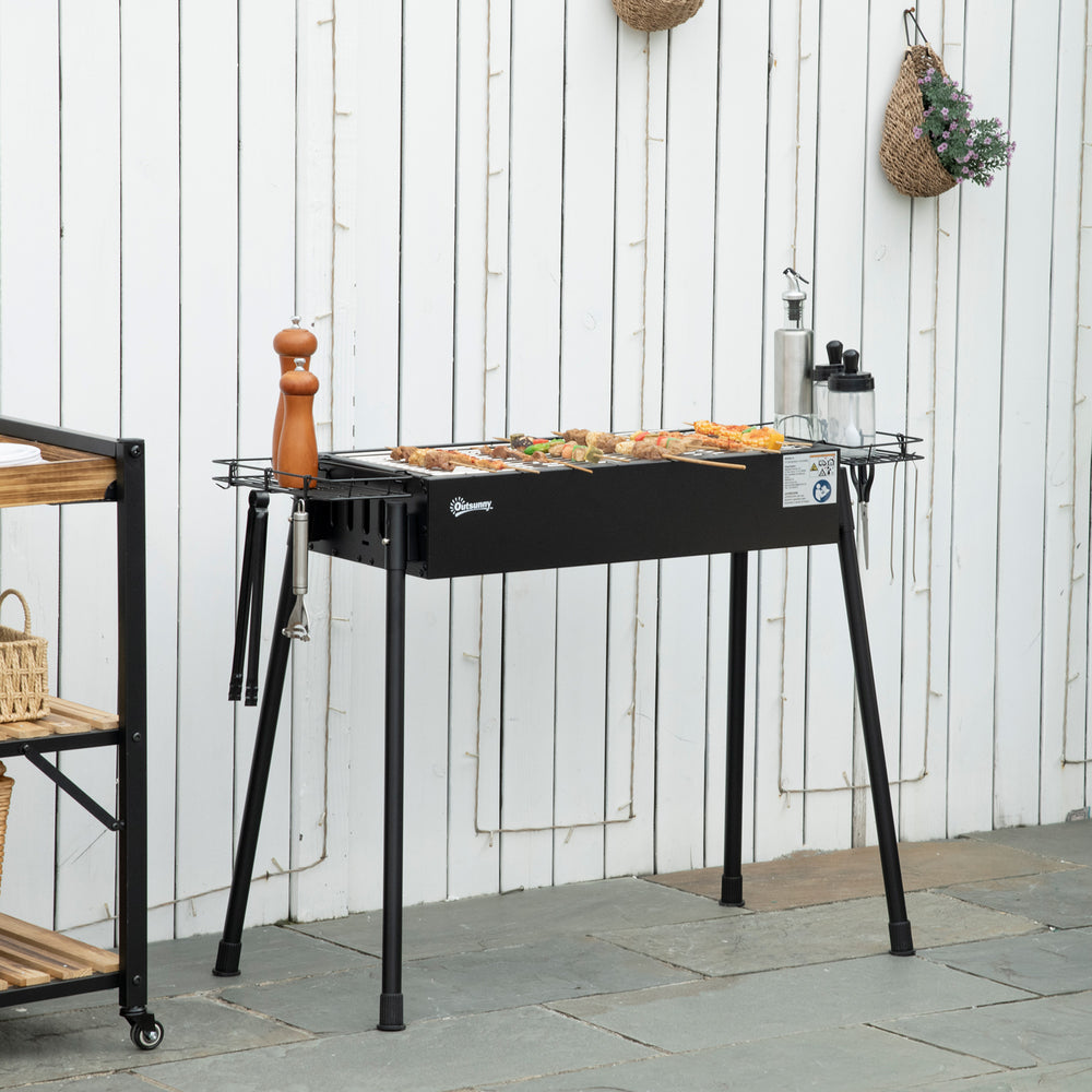 Barbecue au charbon de bois avec paniers à épices latéraux, crochets et filets, noir