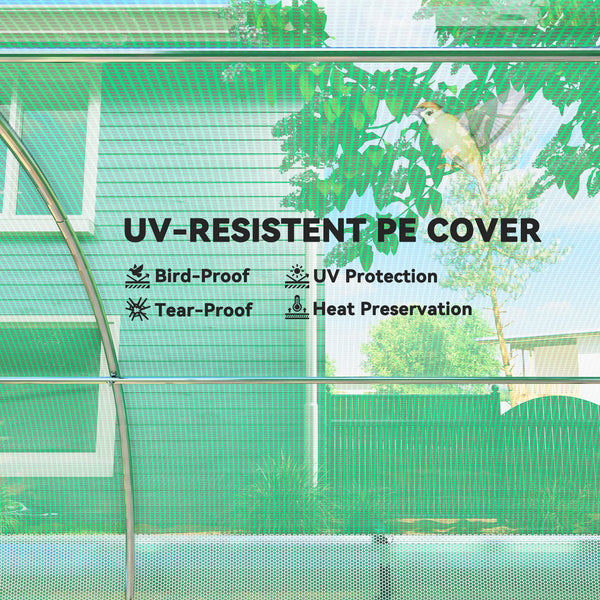 Heated tunnel greenhouse with shade netting, roll-up mesh side panels, green