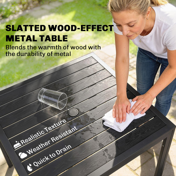 Outdoor dining set for 4 people, wood-look metal patio table and stackable chairs, black