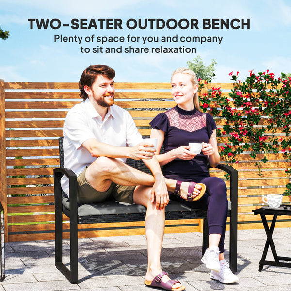 Two-seater outdoor rattan bench with cushion, grey