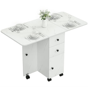 Table de salle à manger à abattants sur roulettes avec tiroirs et placard, blanc marbré