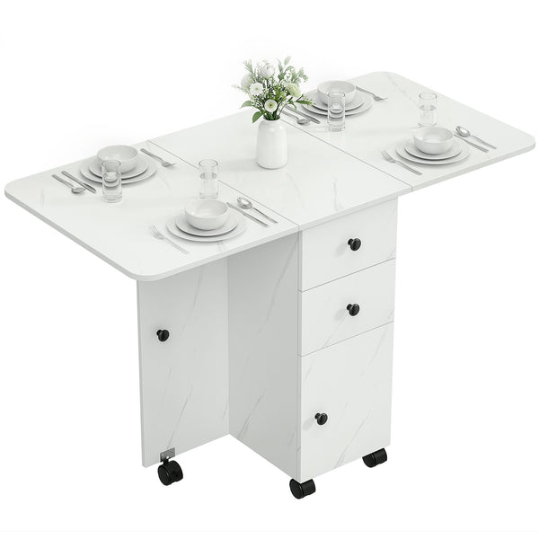 Table de salle à manger à abattants sur roulettes avec tiroirs et placard, blanc marbré