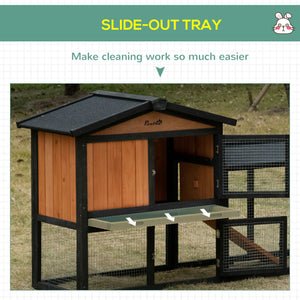 Wooden hutch with run, a playpen, a pull-out tray and a ramp