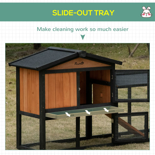 Wooden hutch with run, a playpen, a pull-out tray and a ramp