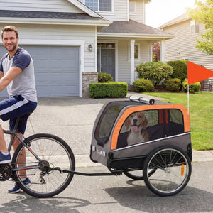 Dog bike trailer with 2 doors, large wheels and safety flag.