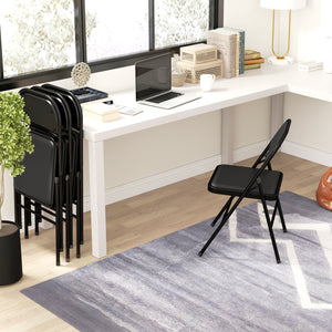 Set of 4 folding metal chairs with faux leather upholstery, black