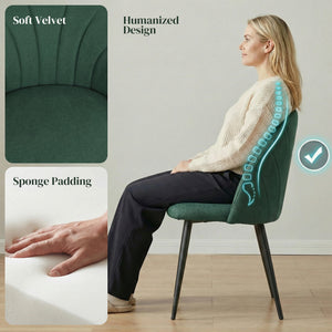 Set of 4 modern dining chairs with metal legs, shell back, and upholstered seat, green.