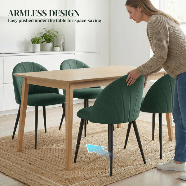 Set of 4 modern dining chairs with metal legs, shell back, and upholstered seat, green.