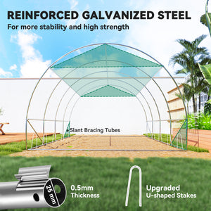 Heated tunnel greenhouse with shade netting, roll-up mesh side panels, green