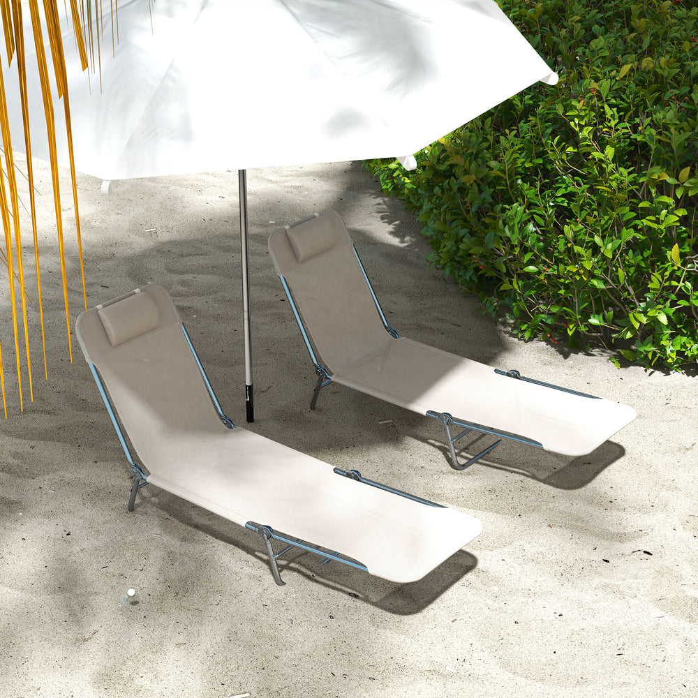 Duo de chaises longues pliantes couleur blanc crème avec coussin rembourré et dossier ajustable pour détente extérieure