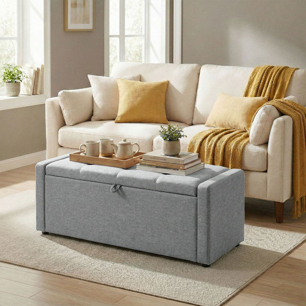 Banc-pouf de rangement, revêtement en tissu aspect lin, assise large rembourrée, gris clair