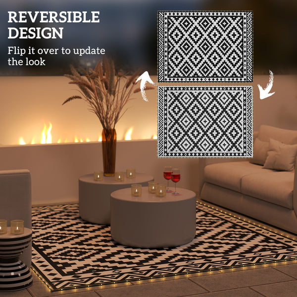 Reversible plastic straw outdoor rug with LED lights 12 ft x 9 ft