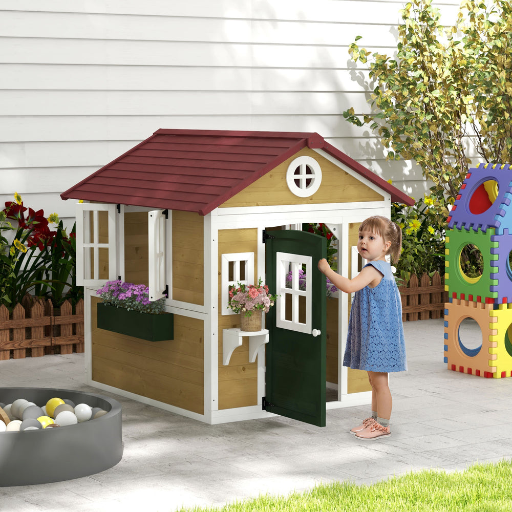 Maisonnette en bois d'extérieur avec porte, fenêtres, pots de fleurs et boîtes