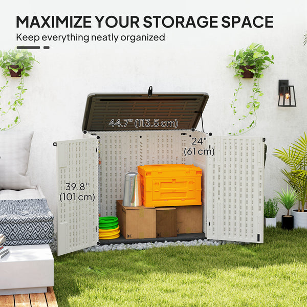 Outdoor storage cabinet with hinged lid and lockable doors