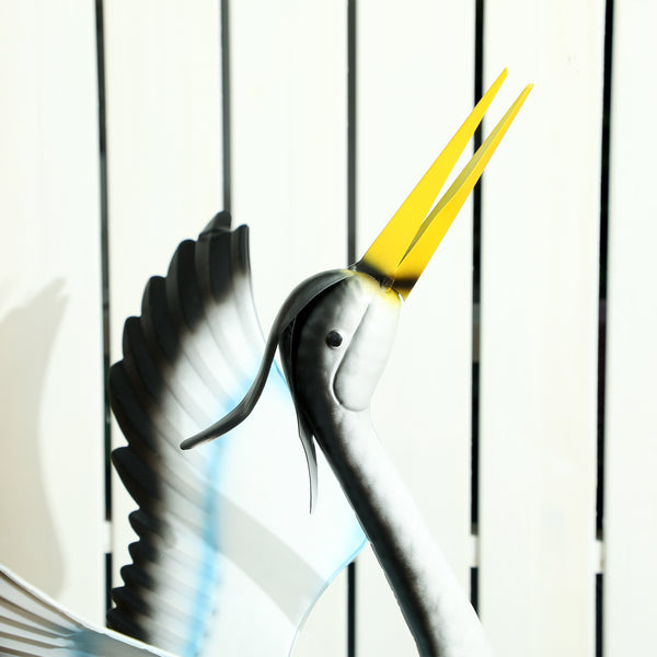 Statue de grue volante