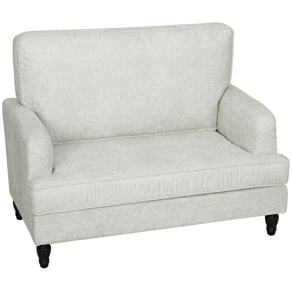 Fauteuil d'appoint moderne en similicuir avec pieds tournés et assise large, blanc crème
