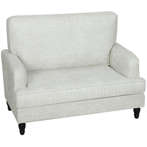 Modern faux leather accent chair with turned legs and wide seat, cream white