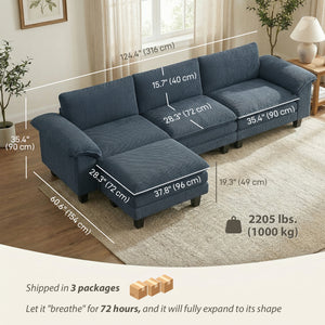 L-shaped sofa with deep seating, removable ottoman, and padded armrests, blue