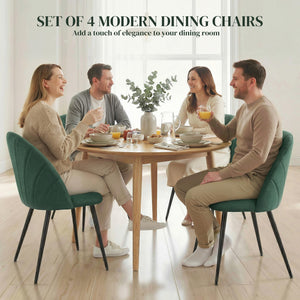 Set of 4 modern dining chairs with metal legs, shell back, and upholstered seat, green.