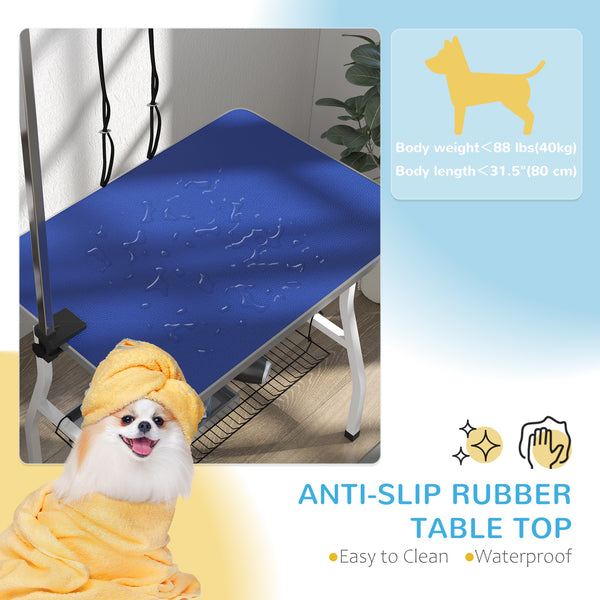 Dog grooming table with adjustable arm, mesh tray and two leashes, blue