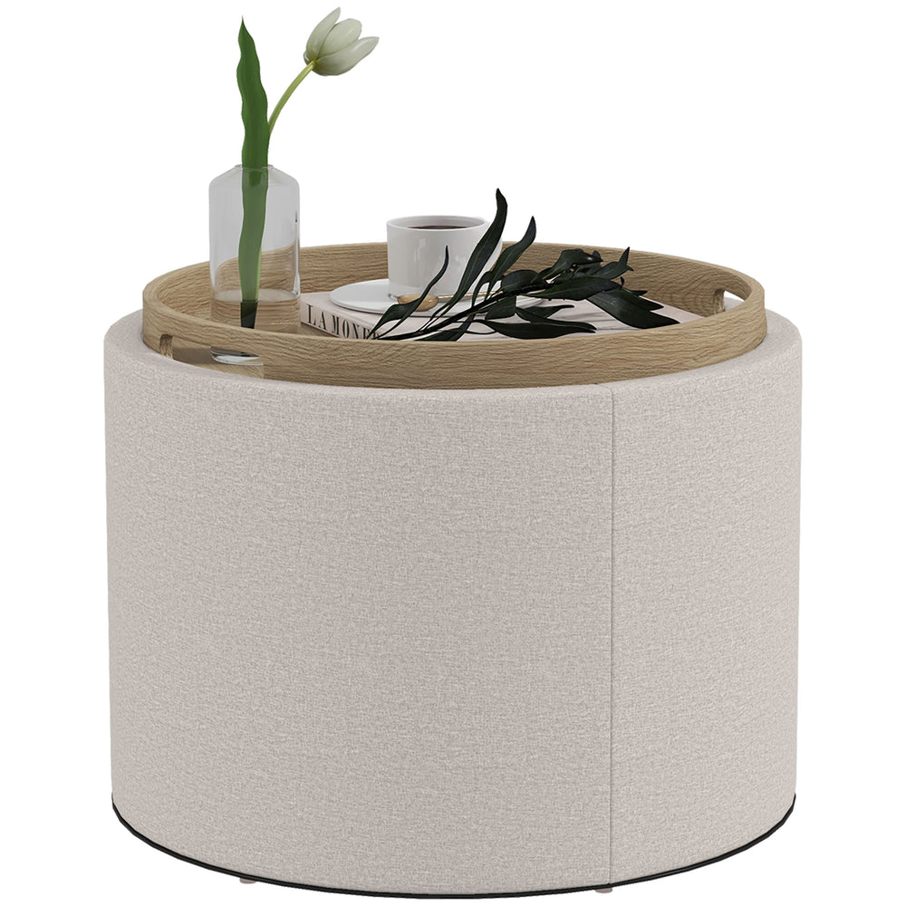 Table basse ronde avec rangement dissimulé et plateau rembourré en lin