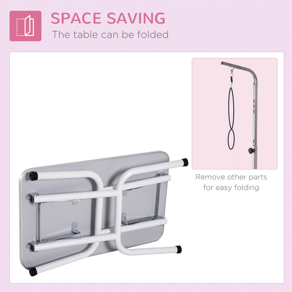 Folding grooming table with adjustable arm and non-slip surface, pink