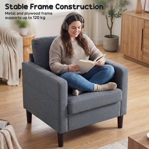 Fauteuil moderne rembourré avec assise et accoudoirs épais et rembourrés, gris foncé