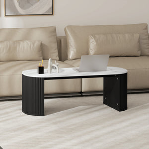 Table de salon moderne effet marbre avec coins arrondis et pieds épais, noire