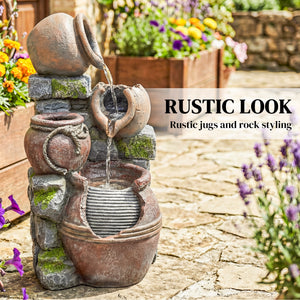 Fontaine d'extérieur avec pot rustique à 4 niveaux, éclairage LED et débit réglable.