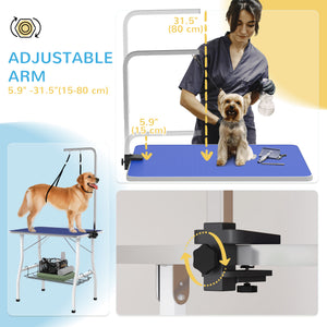 Dog grooming table with adjustable arm, mesh tray and two leashes, blue