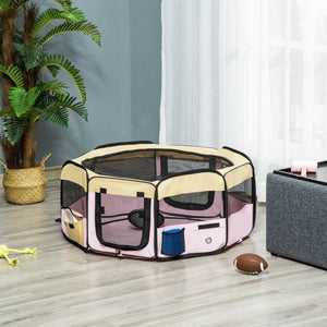 Portable playpen with pink carry bag