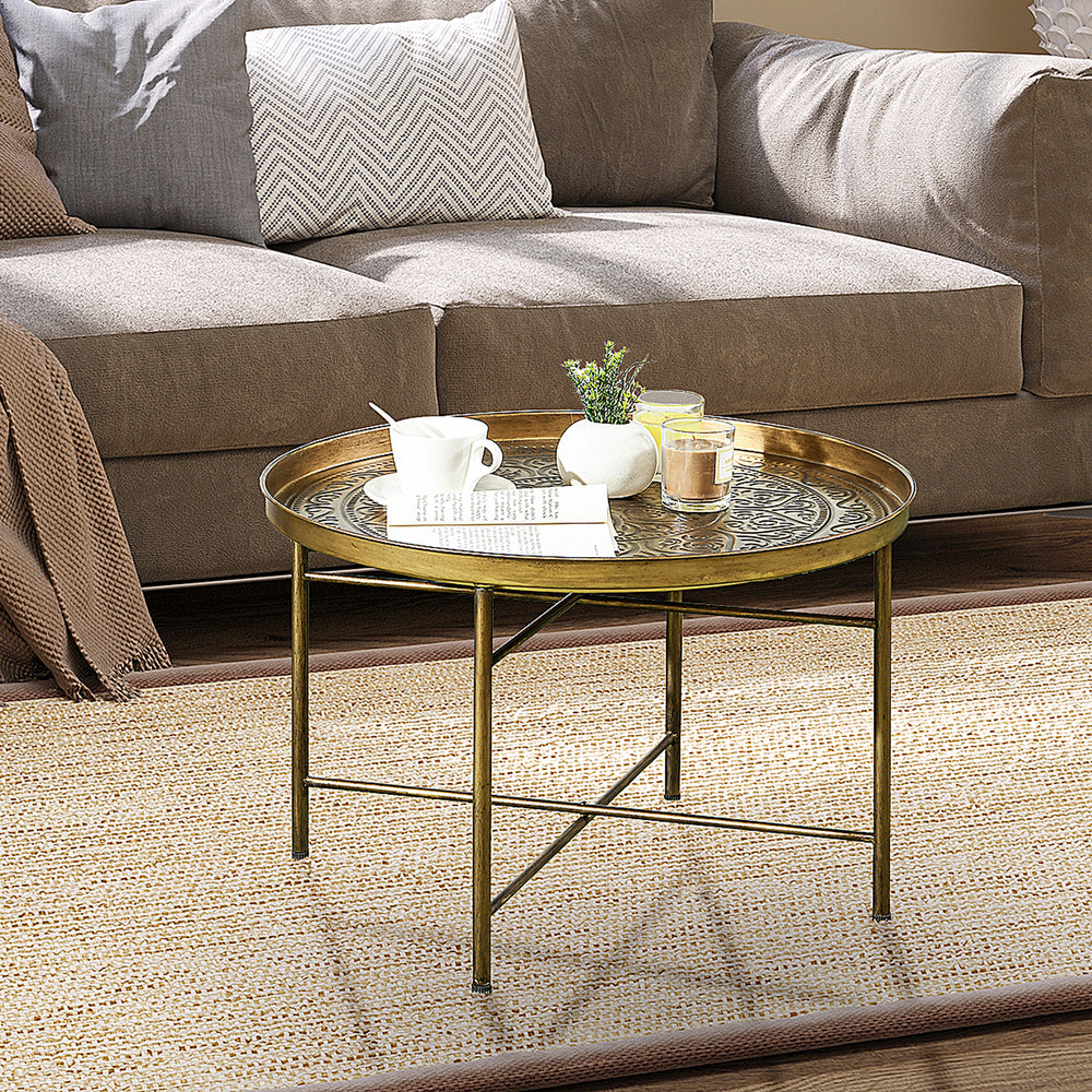 Table basse vintage ronde avec plateau martelé et cadre en métal, dorée