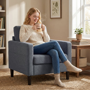 Fauteuil moderne rembourré avec assise et accoudoirs épais et rembourrés, gris foncé