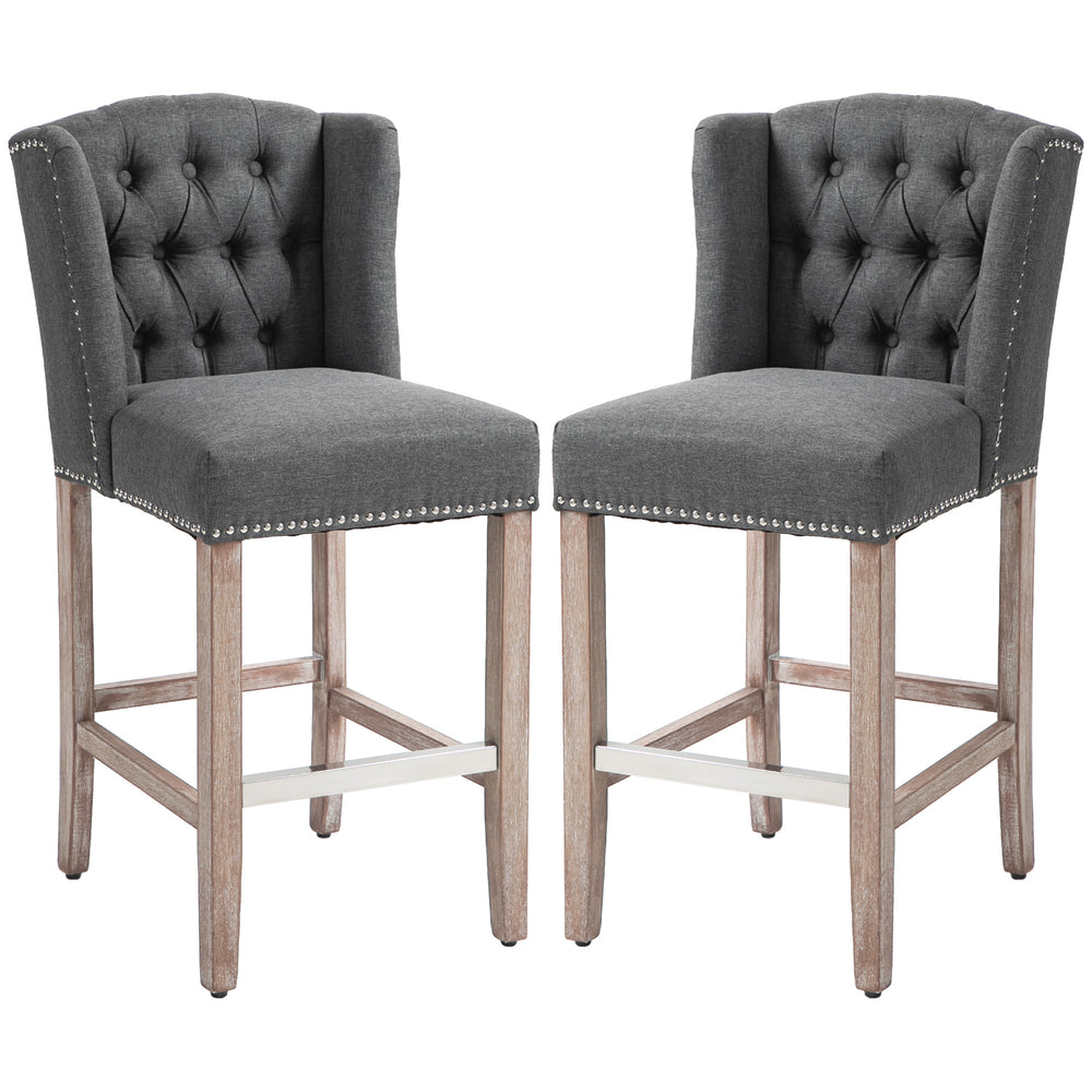Set of 2 upholstered bar stools with studded backrest and footrest, dark grey