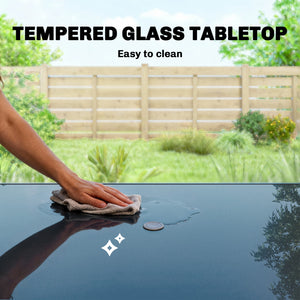 Garden table for 6 people with parasol hole, made of metal with tempered glass top