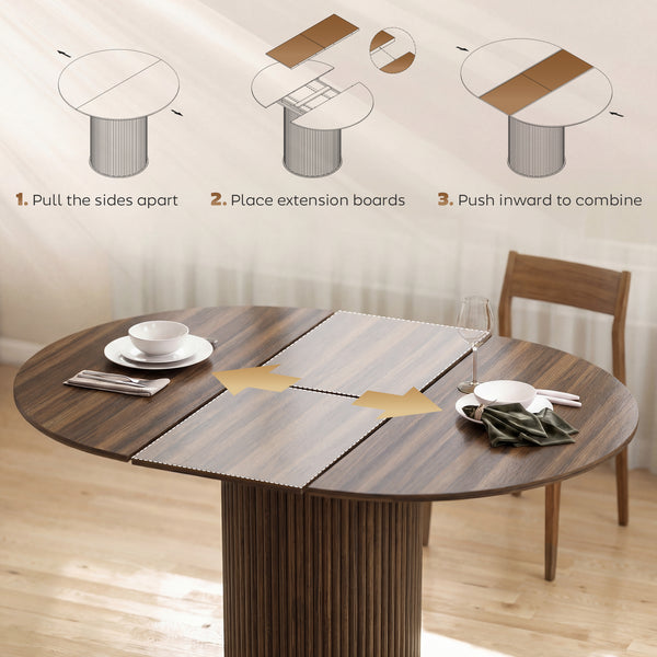 Table de cuisine extensiblepour 6 à 8 personnes style ferme, avec pied central et finition noyer.