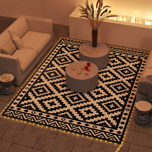 Reversible plastic straw outdoor rug with LED lights 12 ft x 9 ft