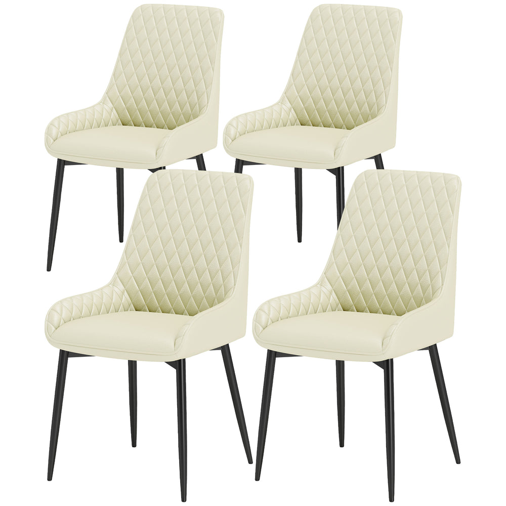 Set of 4 upholstered kitchen chairs, cream color.